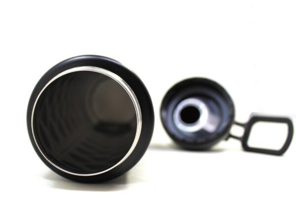 Inner view of stainless steel single wall sipper on white background with spout lid