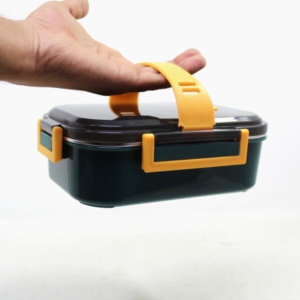 Lunch box with anti-slip rubber soft handle in hand on white background