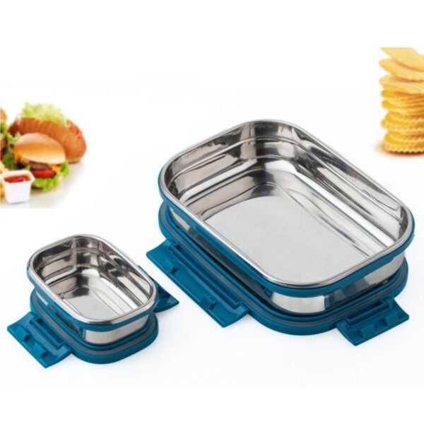 stainless steel lunch box with small container with white background