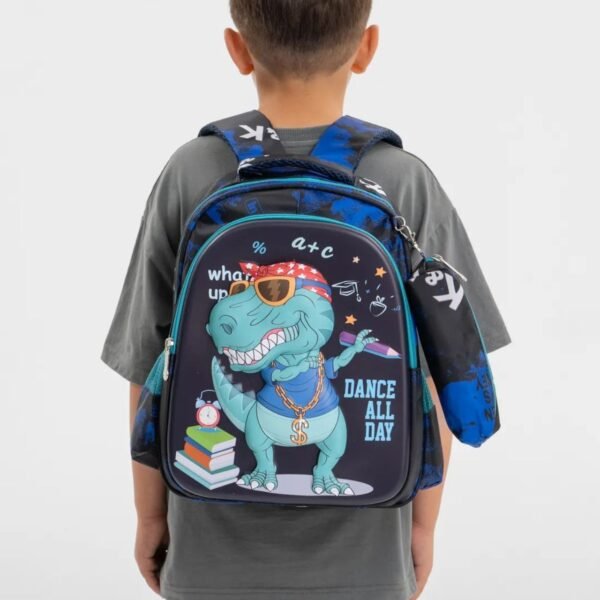 Blue color dino print backpack hanging on kids shoulder