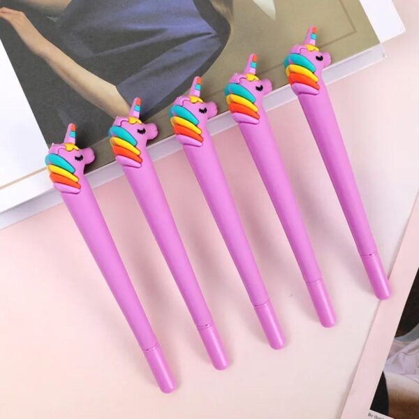 Pink color unicorn head silicone gel ink pen on decorative background