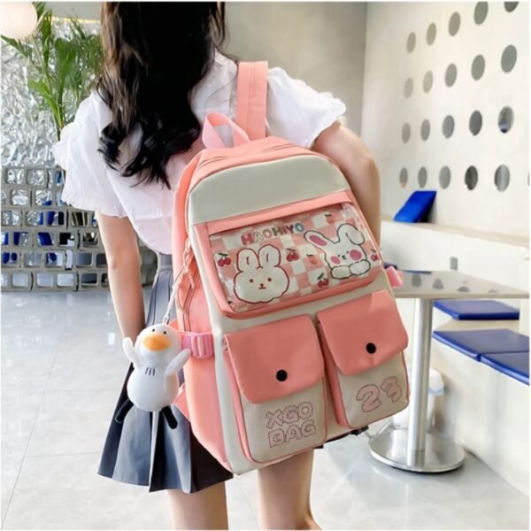 Kids backpack on girl shoulder