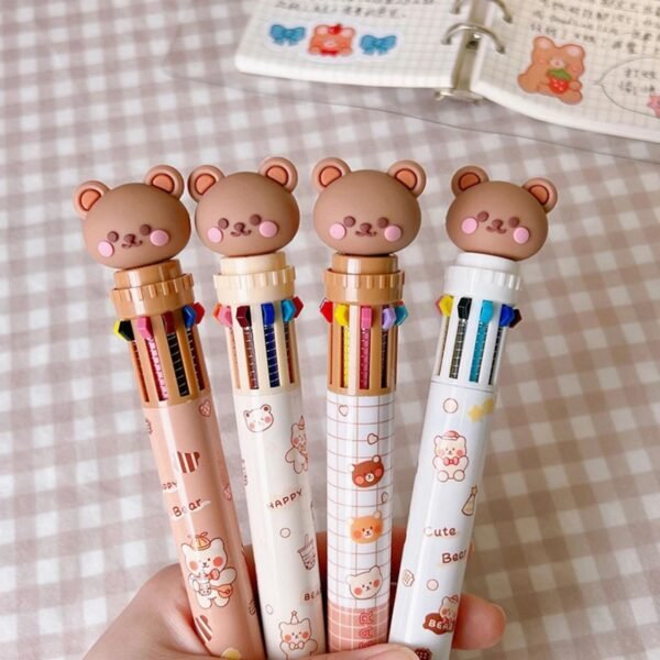 Bear head character head ball pen in hand on decorative background