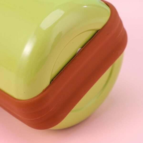 ox bottle showing bottom side green color on pink background