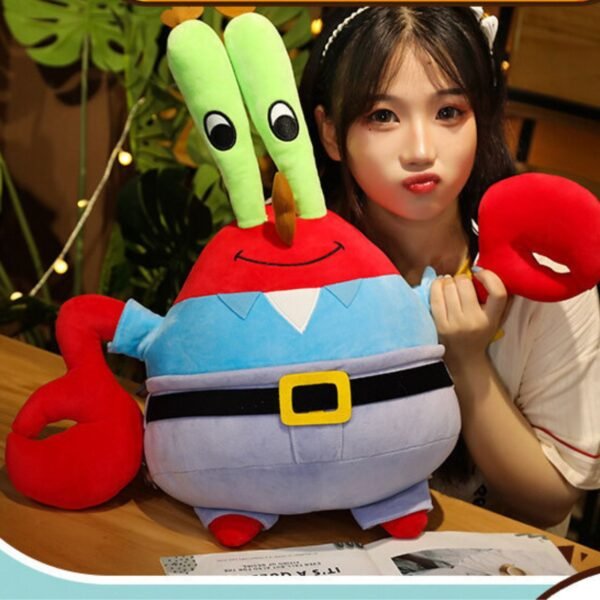Large Mr. Krabs plush toy from SpongeBob SquarePants, featuring red body, green eye stalks, blue shirt and black belt with yellow buckle, held by a young woman.