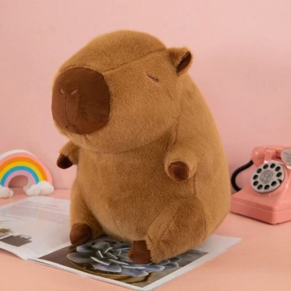 Cute plush capybara toy, soft brown stuffed animal, cuddly capybara doll, desk decor
