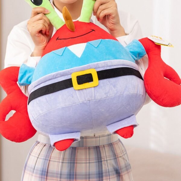 Large Mr. Krabs plush toy from SpongeBob SquarePants, featuring a red body, green eye stalks, blue shirt and black belt with a yellow buckle held by a person wearing a plaid skirt.